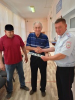 вручение государственного регистрационного знака